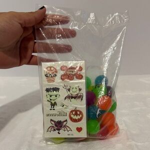 Halloween 40 glow in the dark bounce balls and 10 sheets of tattoos